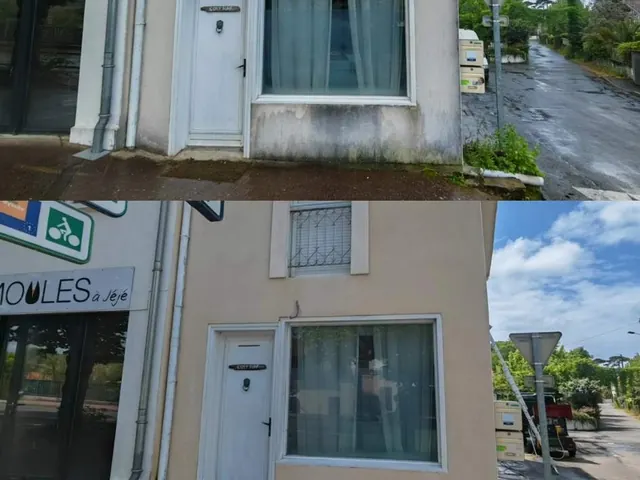 Lance vapeur basse pression en action sur une façade dacquoise